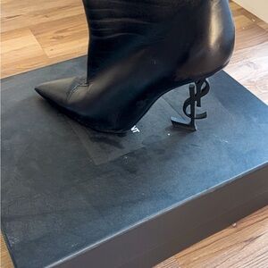 Yves Saint Laurent Sleek Black Heeled Boots
